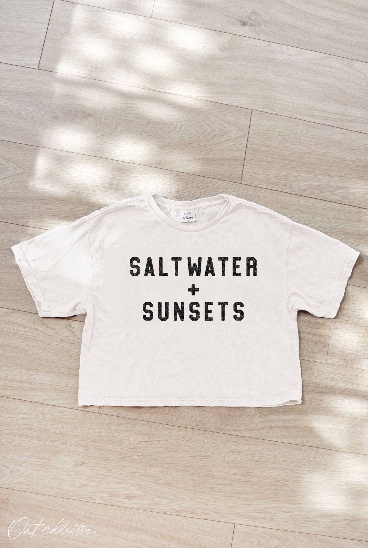 SALT WATER AND SUNSETS Cropped Mineral Graphic Top: DENIM BLUE / L